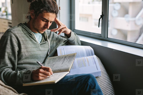 young man studying